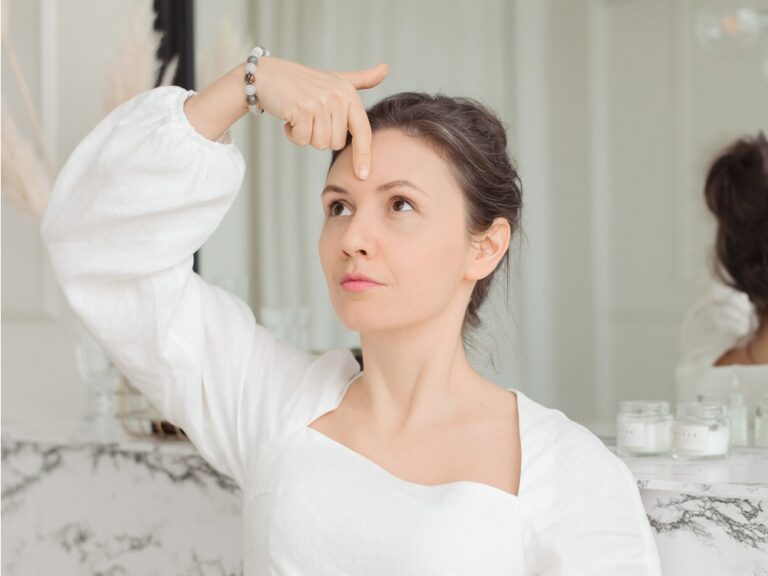 Natalia is showing face fitness practice